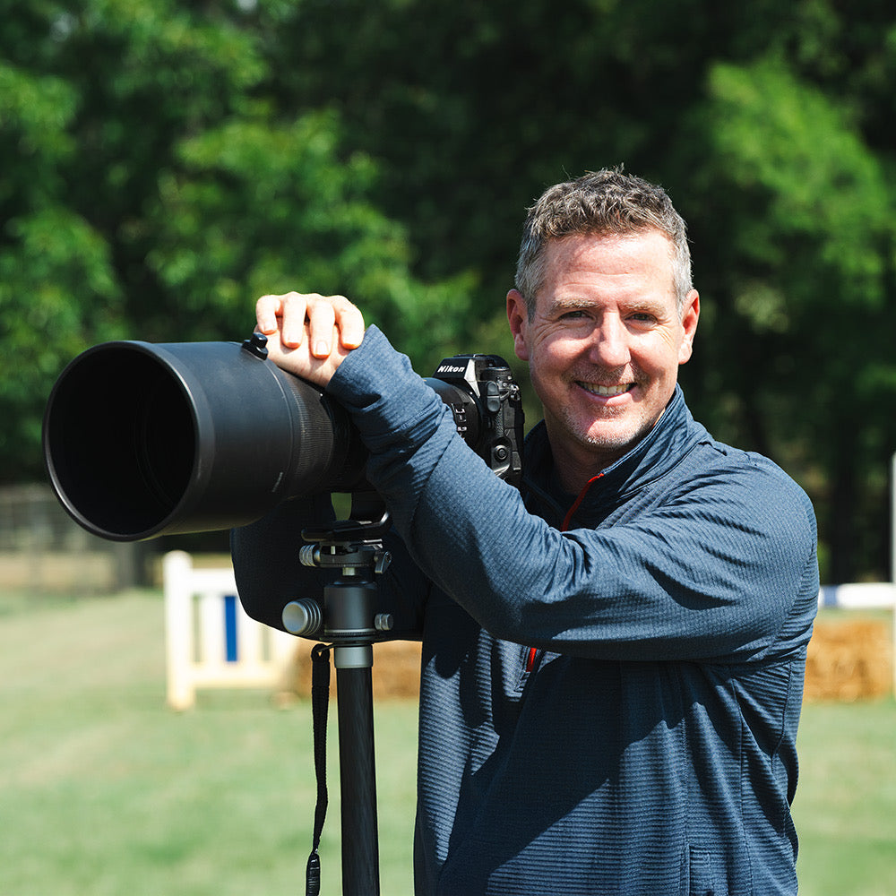 Portrait of Sean Stacey, a professional equine and equestrian photographer based in Dallas, TX who travels to horse shows all over the US at the top horse show facilities covering professional and amateur equestrians. 